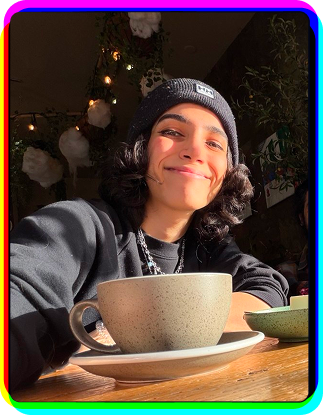 Merry smiling with a cup of tea